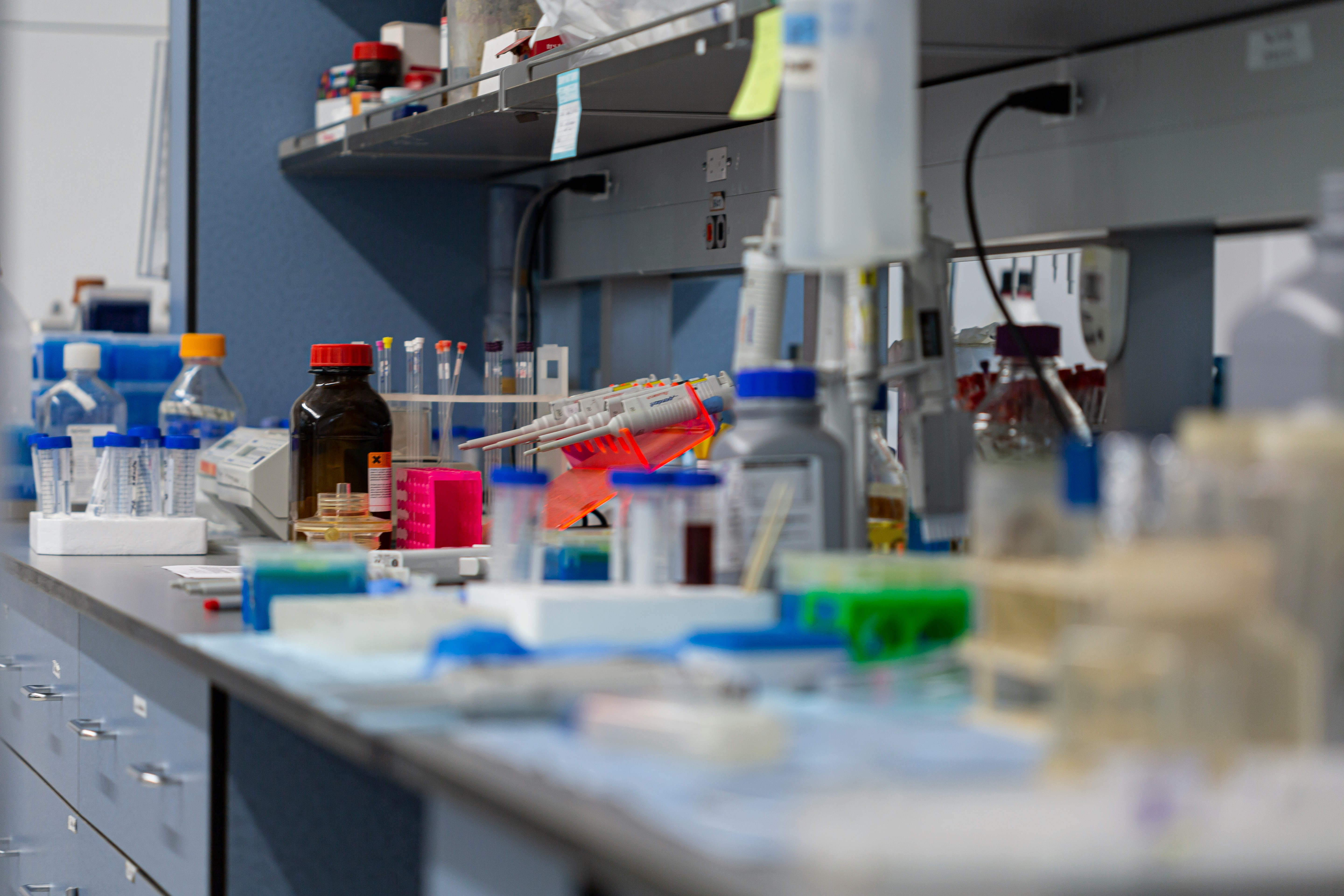 Engineers testing switches on a lab bench