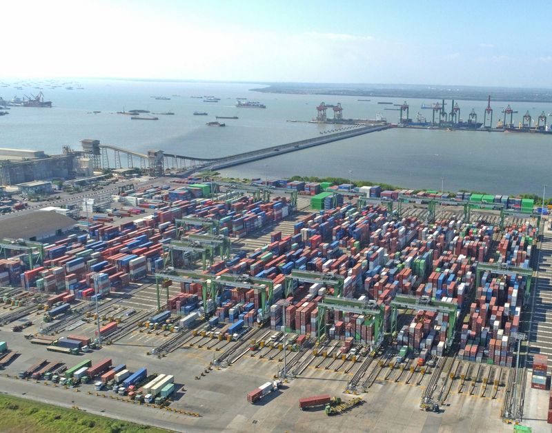 Aerial view of global logistics port at dusk